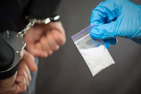 Exclusive Over 1 kilogram of cocaine, automatic weapons and money in a few currency police raided the 22-year-old residence in Gjakova, his identity revealed.
